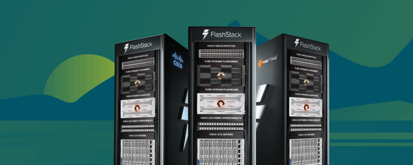 Three Pure Storage FlashStack kiosks displayed against a colorful, artistic background